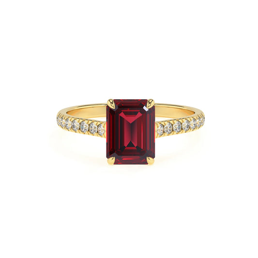 lab grown ruby emerald cut half eternity solitaire engagement rings in yellow gold 