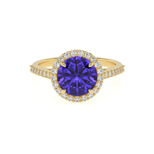 lab grown tanzanite round solitaire rings in yellow gold 