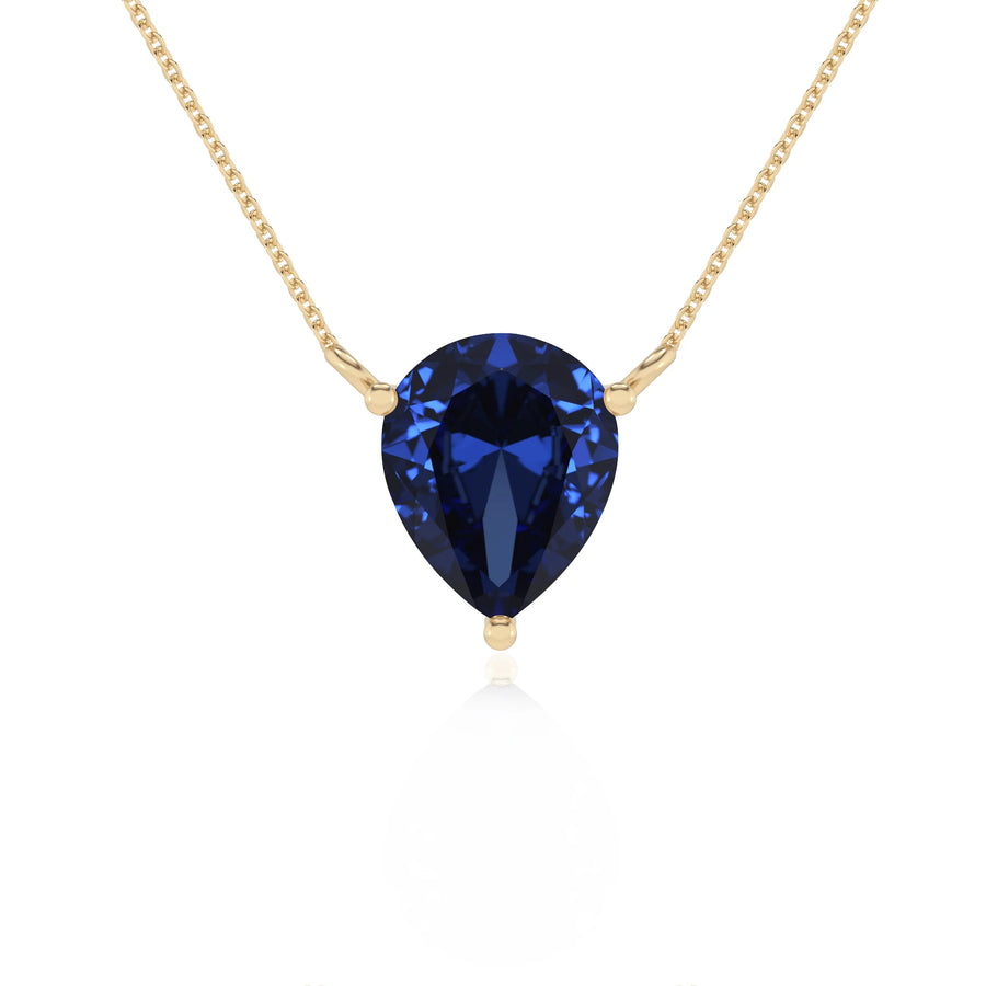 lab grown blue-sapphire pear solitaire necklaces in yellow gold 