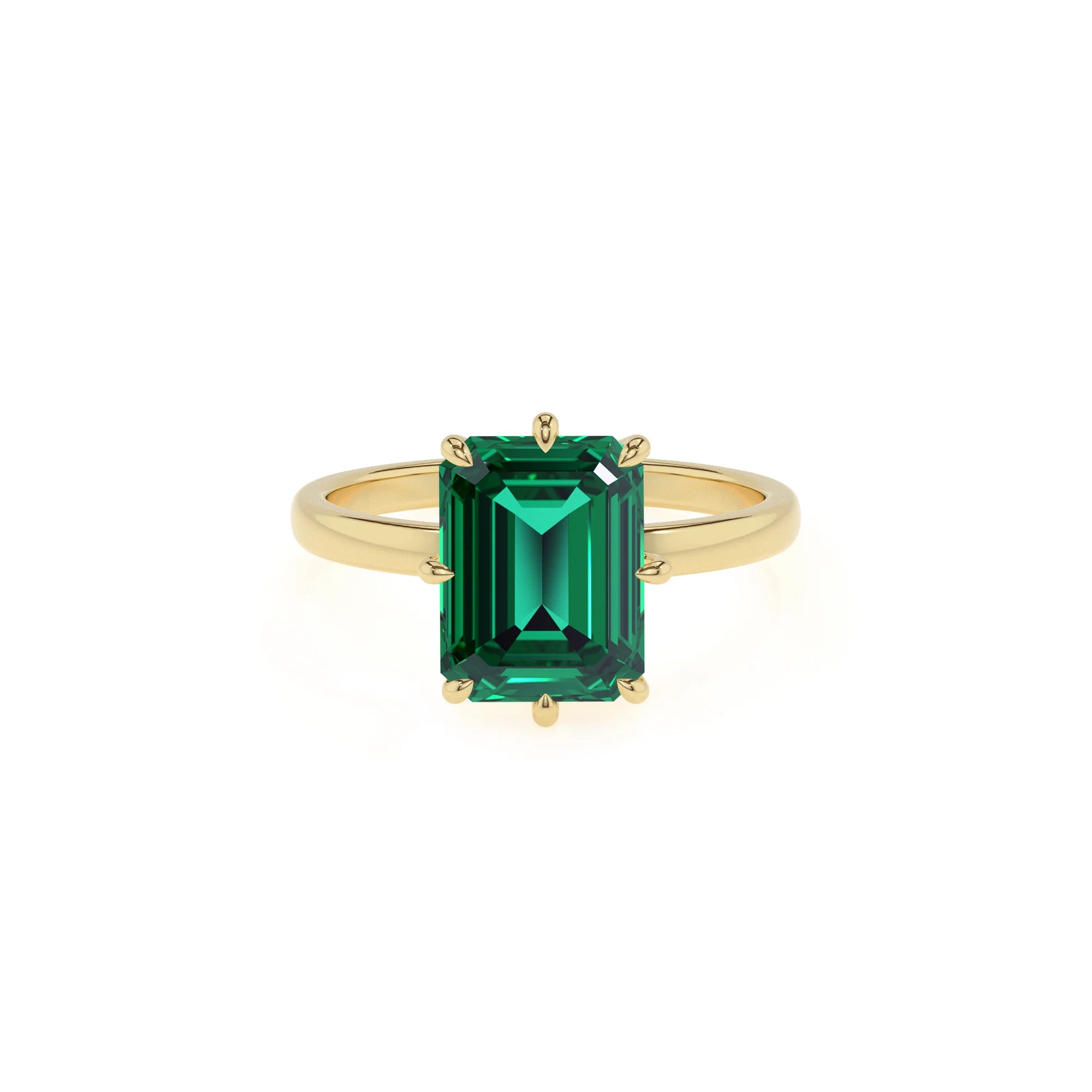 lab grown emerald octogon cut solitaire rings in yellow gold 