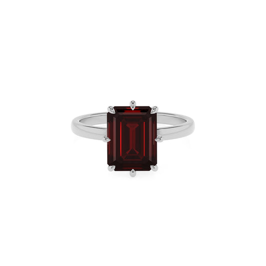 natural garnet emerald cut solitaire rings in white gold 