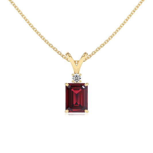 lab grown ruby emerald cut solitaire v-bale necklaces in yellow gold 