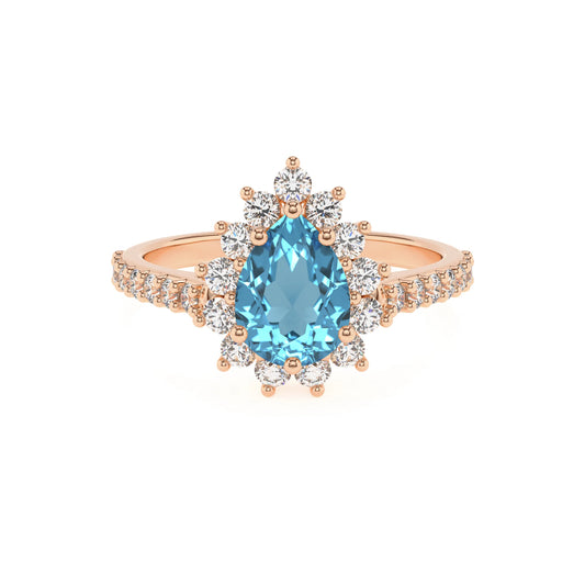 natural swiss-blue-topaz pear solitaire rings in rose gold 