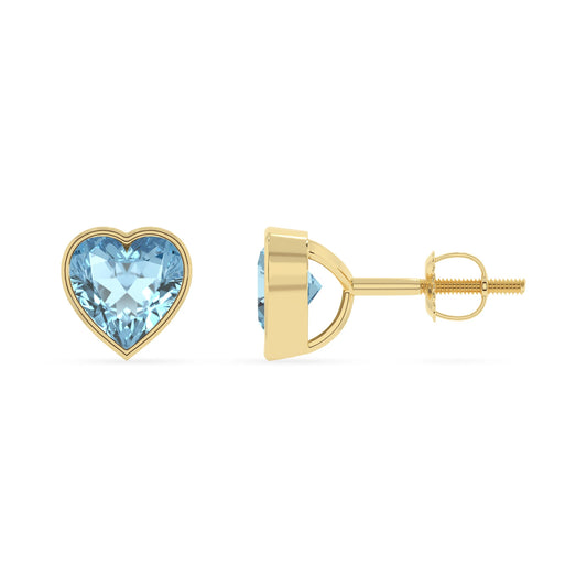 lab grown aquamarine emerald cut stud earrings in yellow gold 