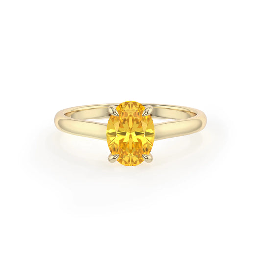 lab grown yellow-sapphire oval solitaire rings in yellow gold 