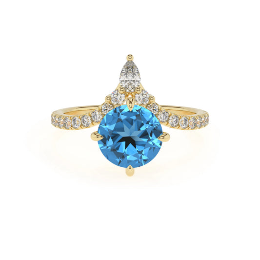 natural swiss-blue-topaz round solitaire rings in yellow gold 