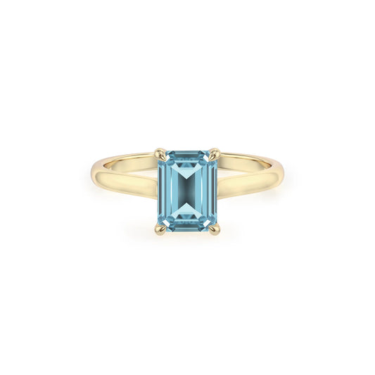 lab grown aquamarine emerald cut solitaire rings in yellow gold 