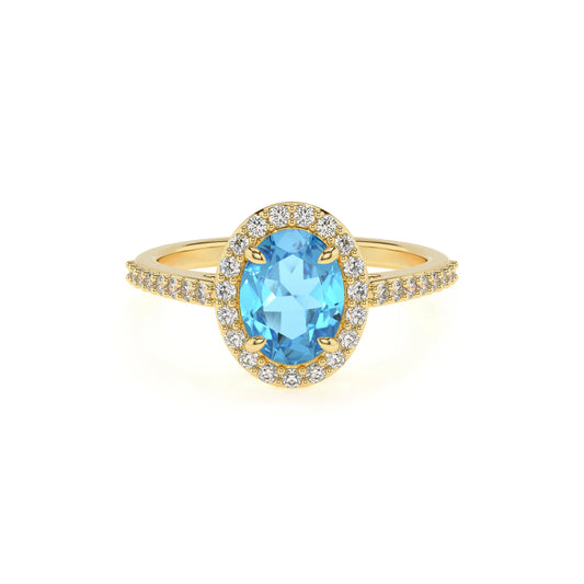 natural swiss-blue-topaz oval solitaire rings in yellow gold 