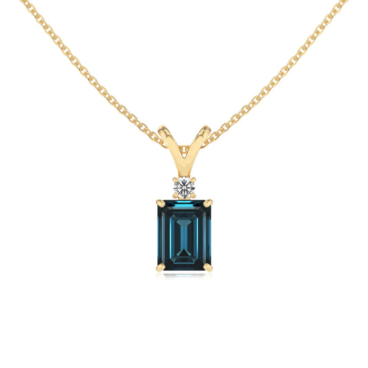 natural london-blue-topaz emerald cut solitaire v-bale necklaces in yellow gold 