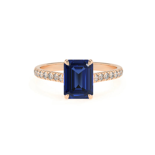 lab grown blue-sapphire emerald cut half eternity solitaire engagement rings in rose gold 