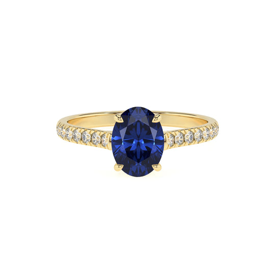 lab grown blue-sapphire oval half eternity solitaire engagement rings in yellow gold 