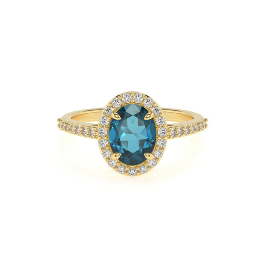 natural london-blue-topaz oval solitaire rings in yellow gold 