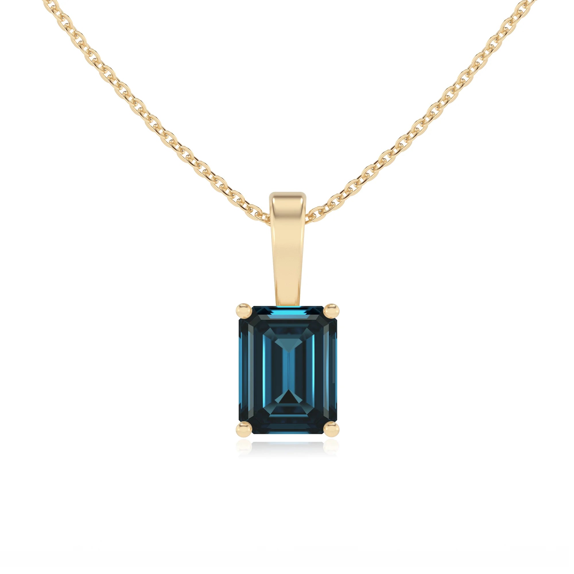 natural london-blue-topaz emerald cut solitaire necklaces in yellow gold 