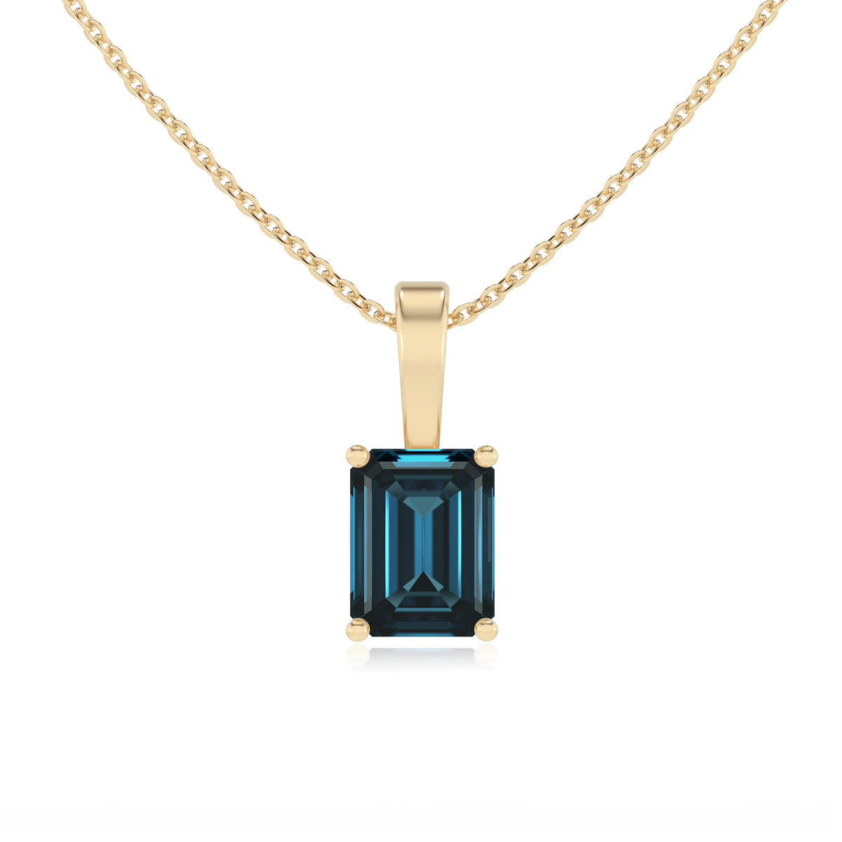 natural london-blue-topaz emerald cut solitaire necklaces in yellow gold 