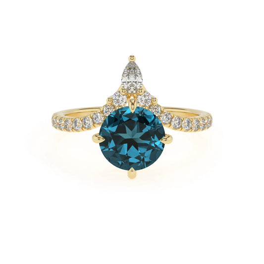 natural london-blue-topaz round solitaire rings in yellow gold 