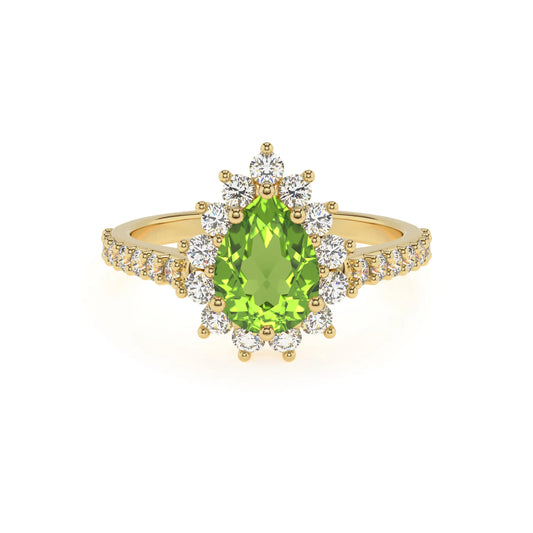 natural peridot pear solitaire rings in yellow gold 