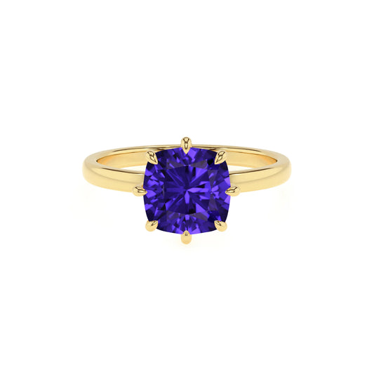 lab grown tanzanite cushion solitaire rings in yellow gold 