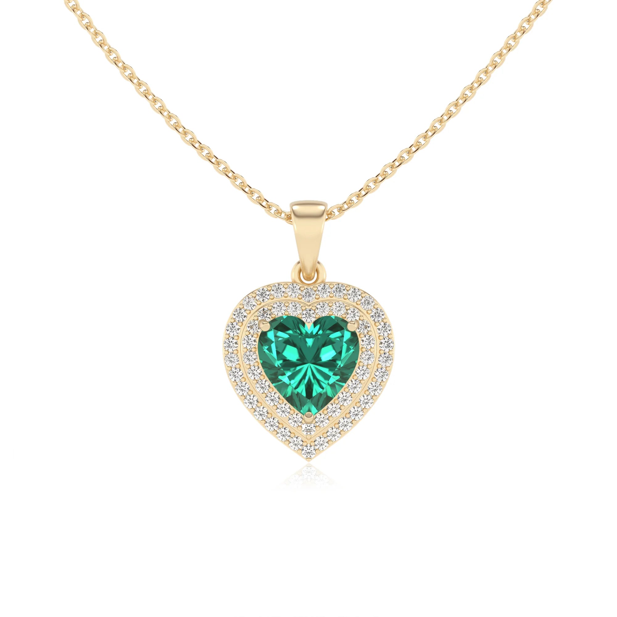 lab grown emerald heart halo necklaces in yellow gold 
