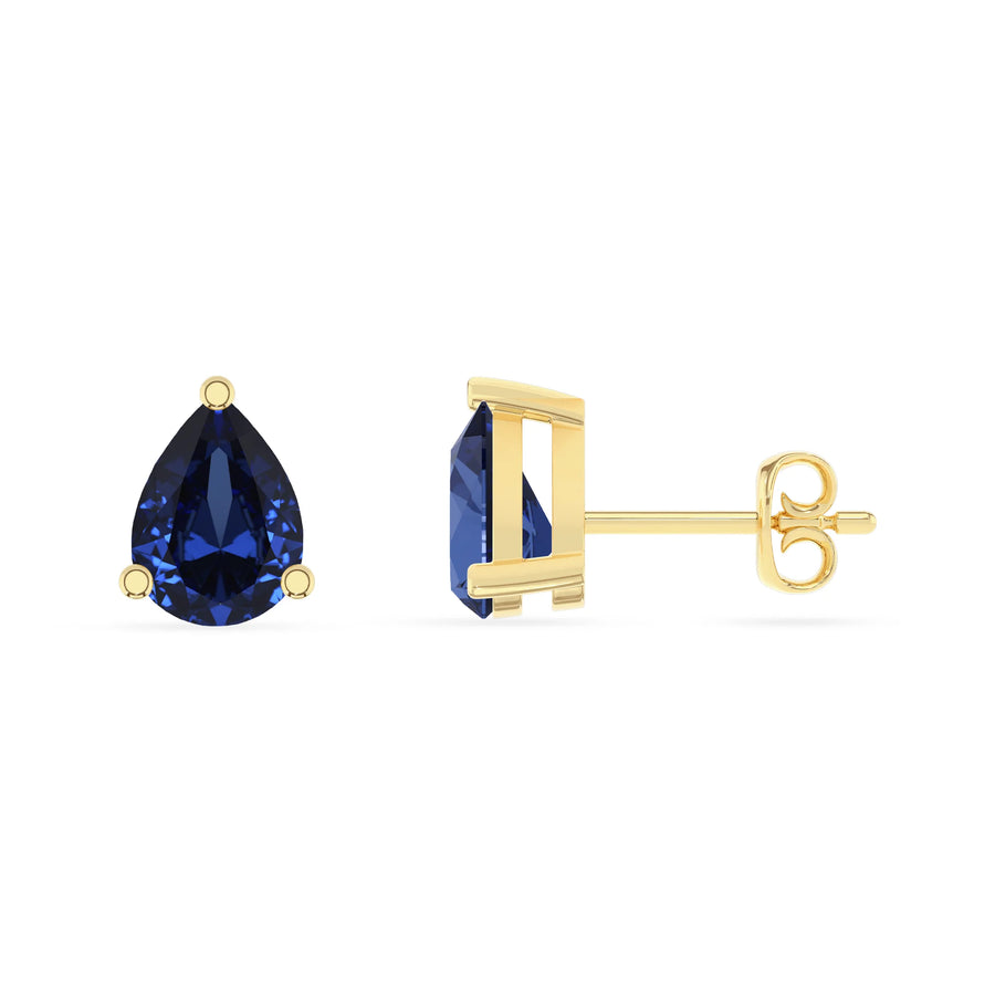 lab grown blue sapphire pear stud earrings in yellow gold 