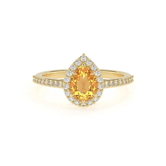 lab grown citrine pear solitaire rings in yellow gold 