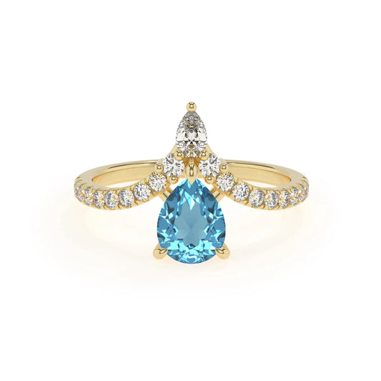 natural swiss-blue-topaz pear solitaire rings in yellow gold 