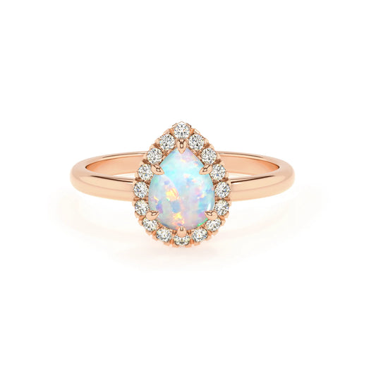 lab grown opal pear solitaire rings in rose gold 