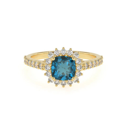 natural london-blue-topaz cushion solitaire rings in yellow gold 