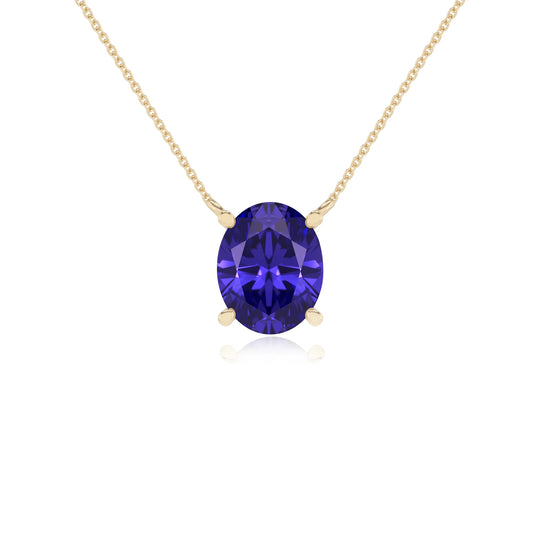 lab grown tanzanite oval solitaire necklaces in yellow gold 