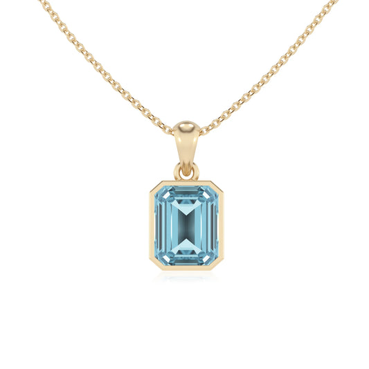 lab grown aquamarine emerald cut solitaire necklaces in yellow gold 