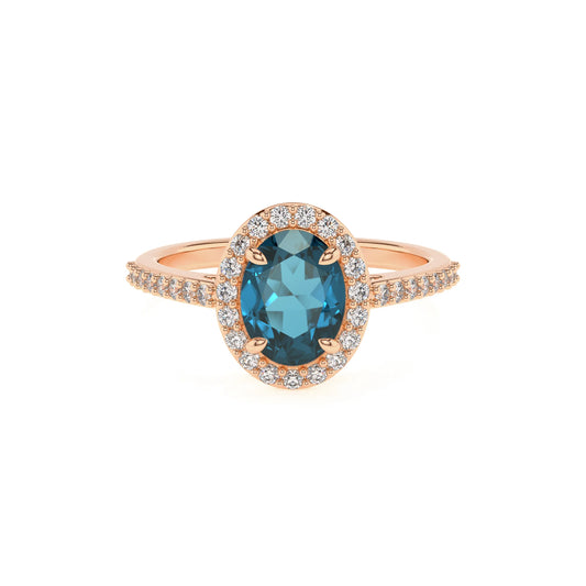 natural london-blue-topaz oval solitaire rings in rose gold 