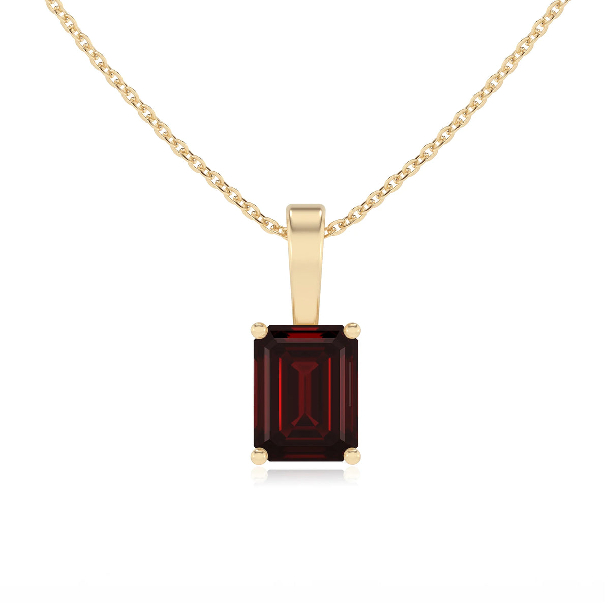 natural garnet emerald cut solitaire necklaces in yellow gold 