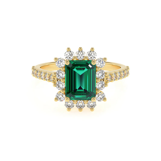 lab grown emerald octogon cut solitaire rings in yellow gold 