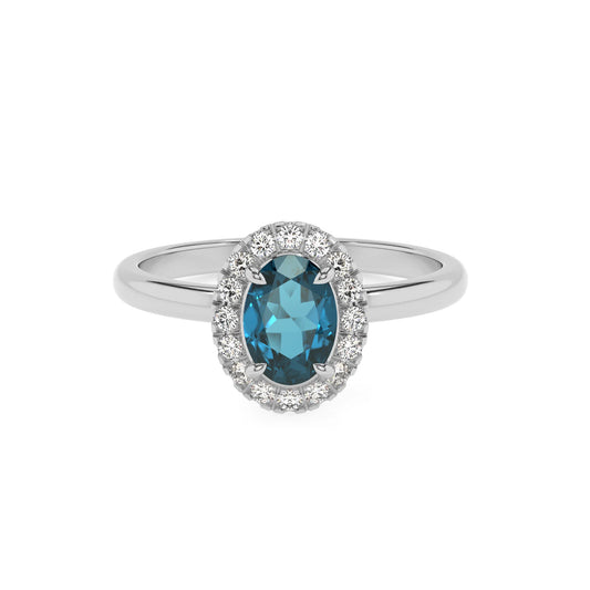 natural london-blue-topaz oval solitaire rings in white gold 