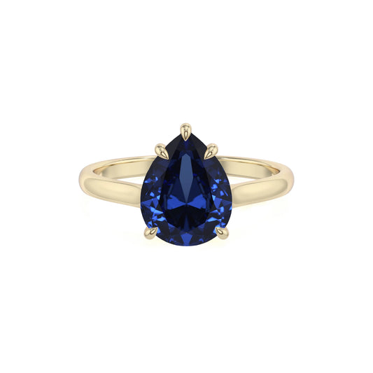 lab grown blue-sapphire pear solitaire rings in yellow gold 