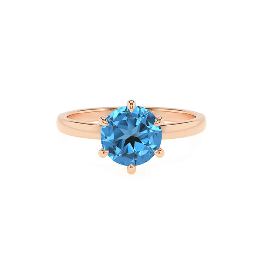natural swiss-blue-topaz round solitaire rings in rose gold 