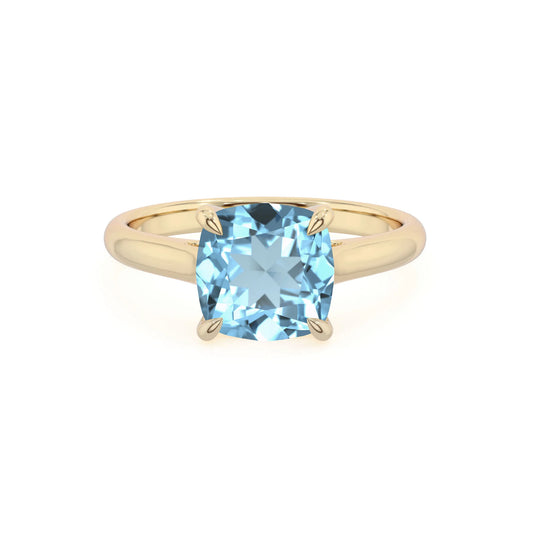 lab grown aquamarine cushion solitaire rings in yellow gold 