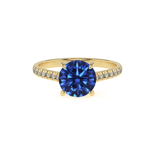 lab grown blue-sapphire round half eternity solitaire engagement rings in yellow gold 