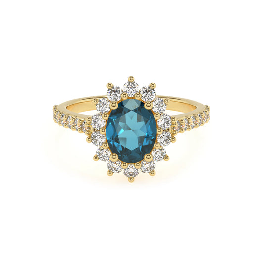 natural london-blue-topaz oval solitaire rings in yellow gold 