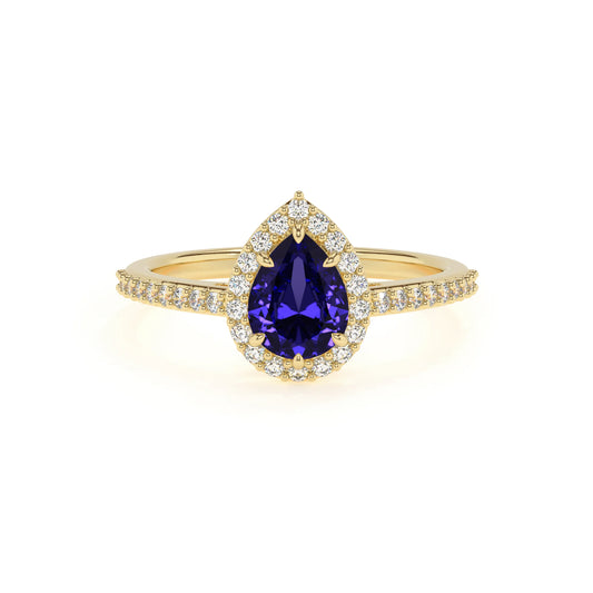 lab grown tanzanite pear solitaire rings in yellow gold 