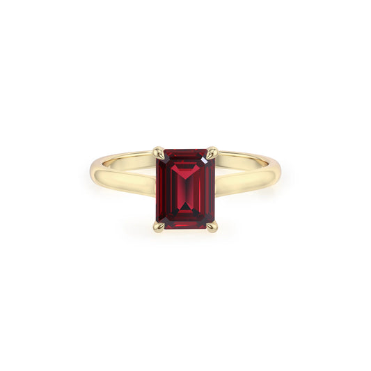 lab grown ruby emerald cut solitaire rings in yellow gold 