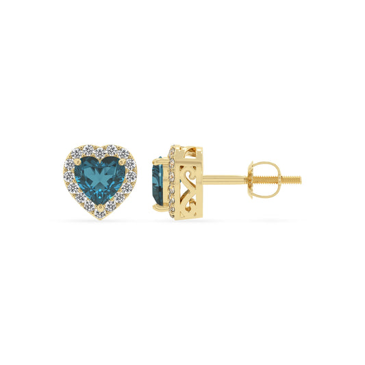natural london blue topaz heart stud earrings in yellow gold 