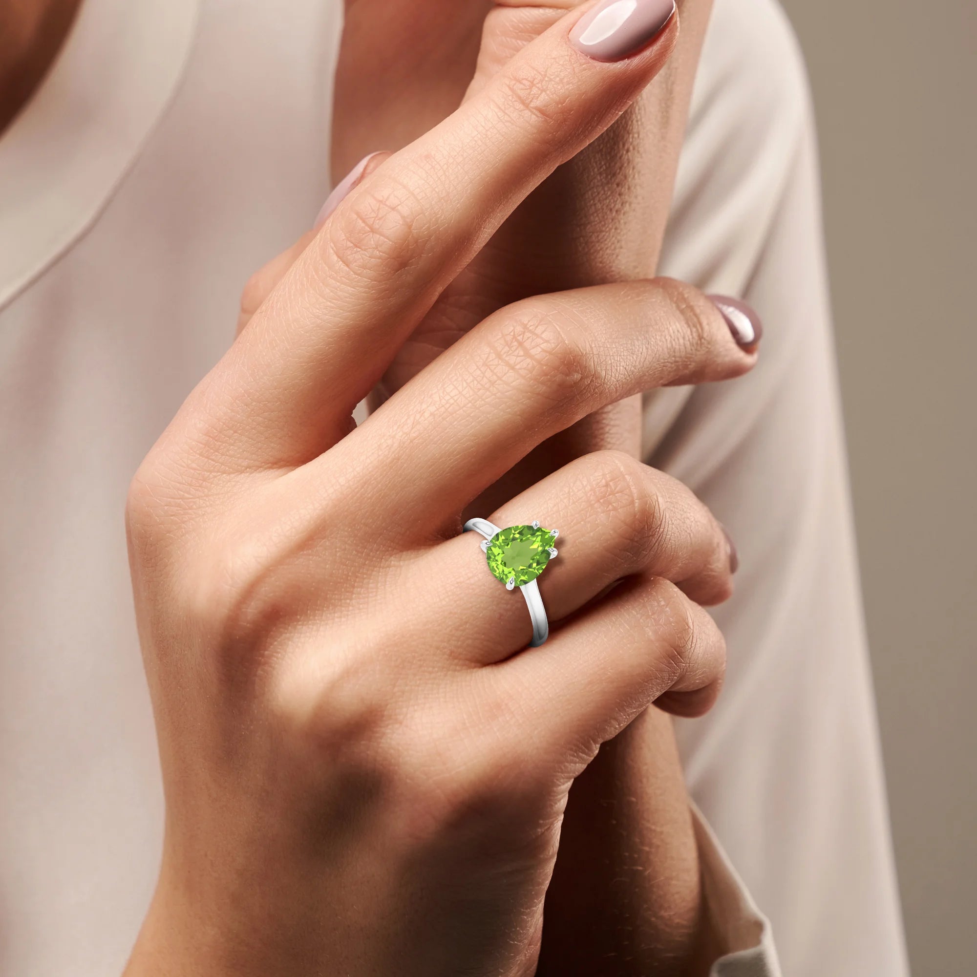 natural peridot pear solitaire rings in platinum 