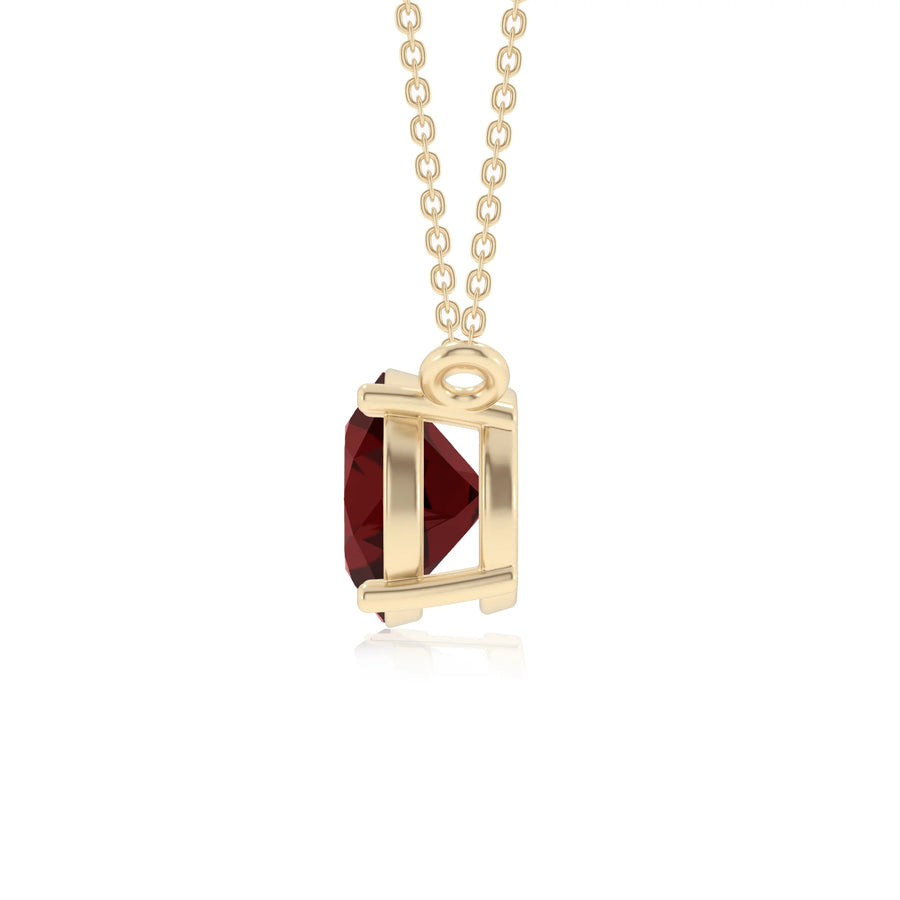 natural garnet round solitaire necklaces in yellow gold 