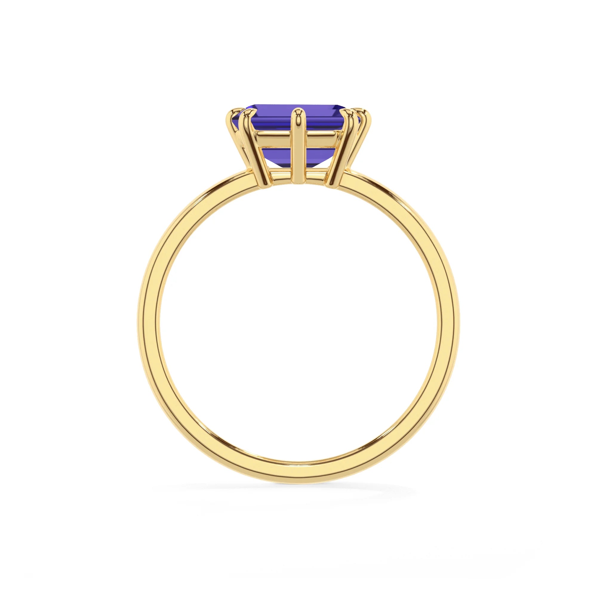 lab grown tanzanite emerald cut solitaire rings in yellow gold 