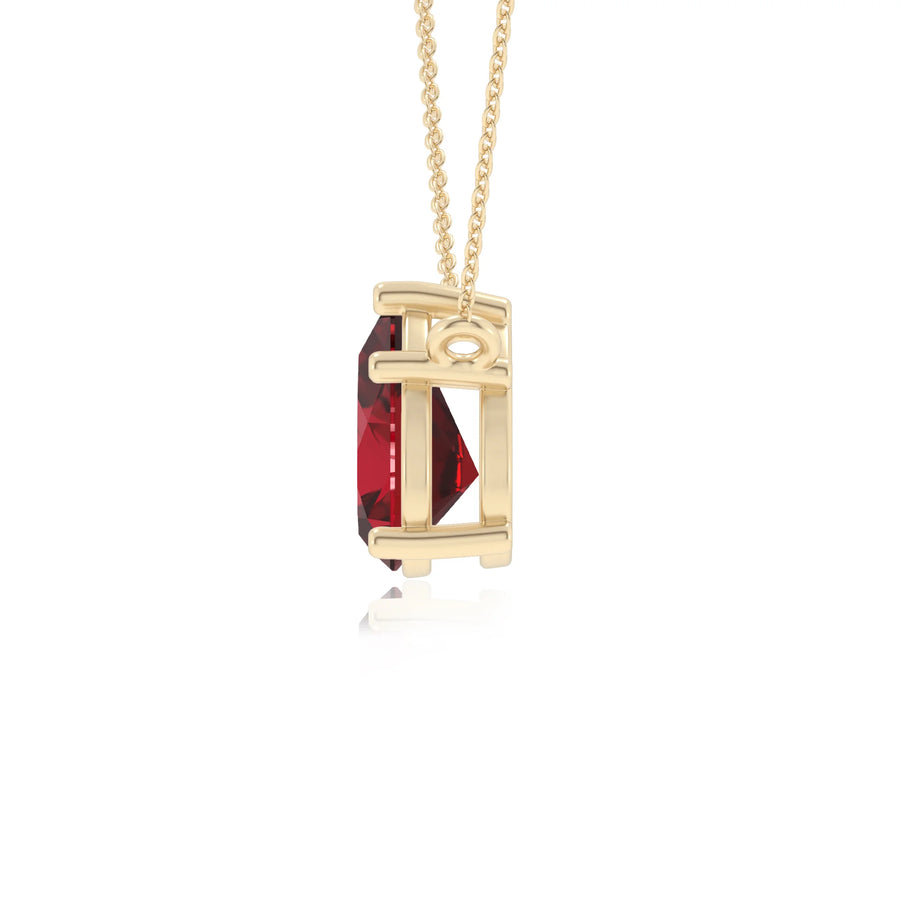 lab grown ruby pear solitaire necklaces in yellow gold 