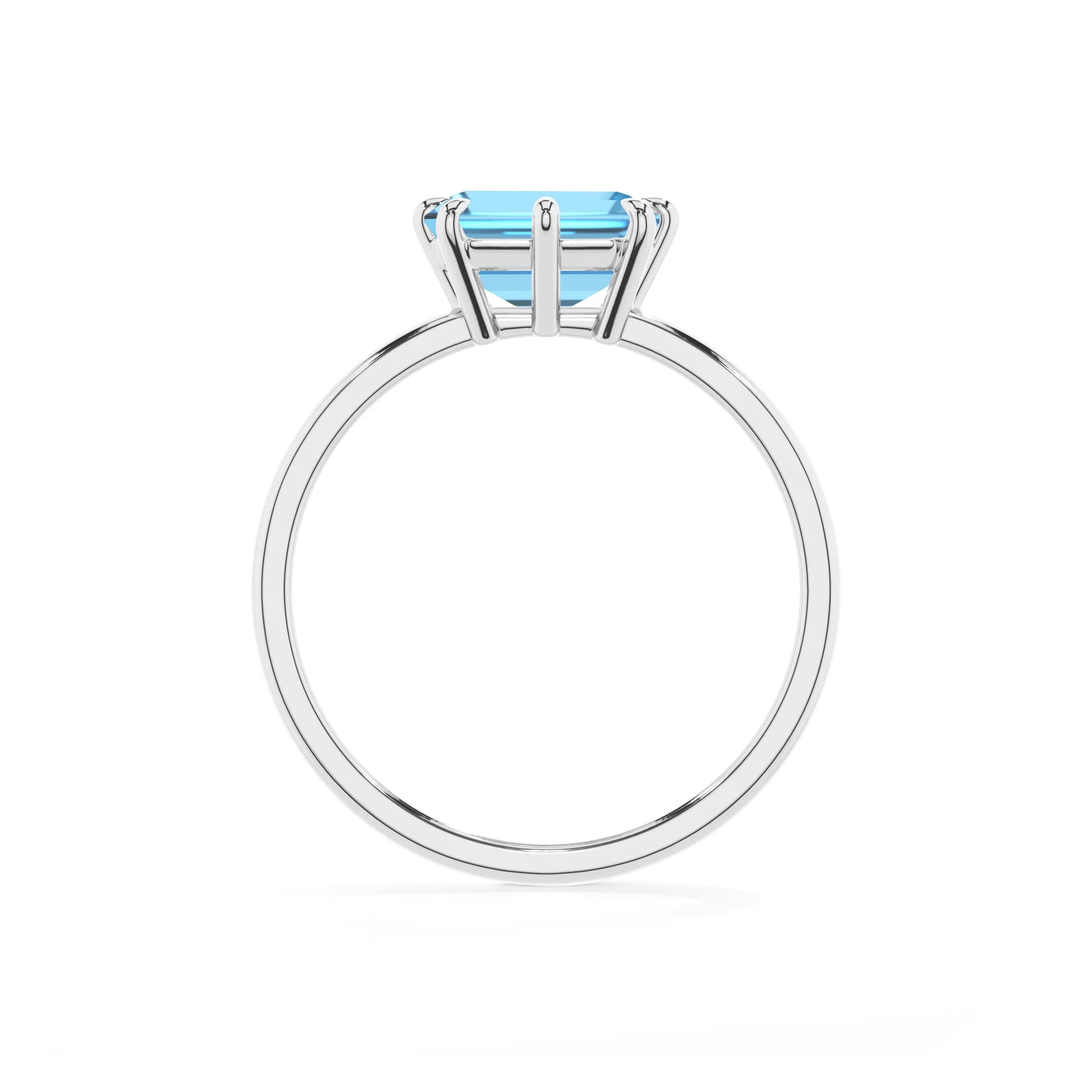 natural swiss-blue-topaz emerald cut solitaire rings in white gold 