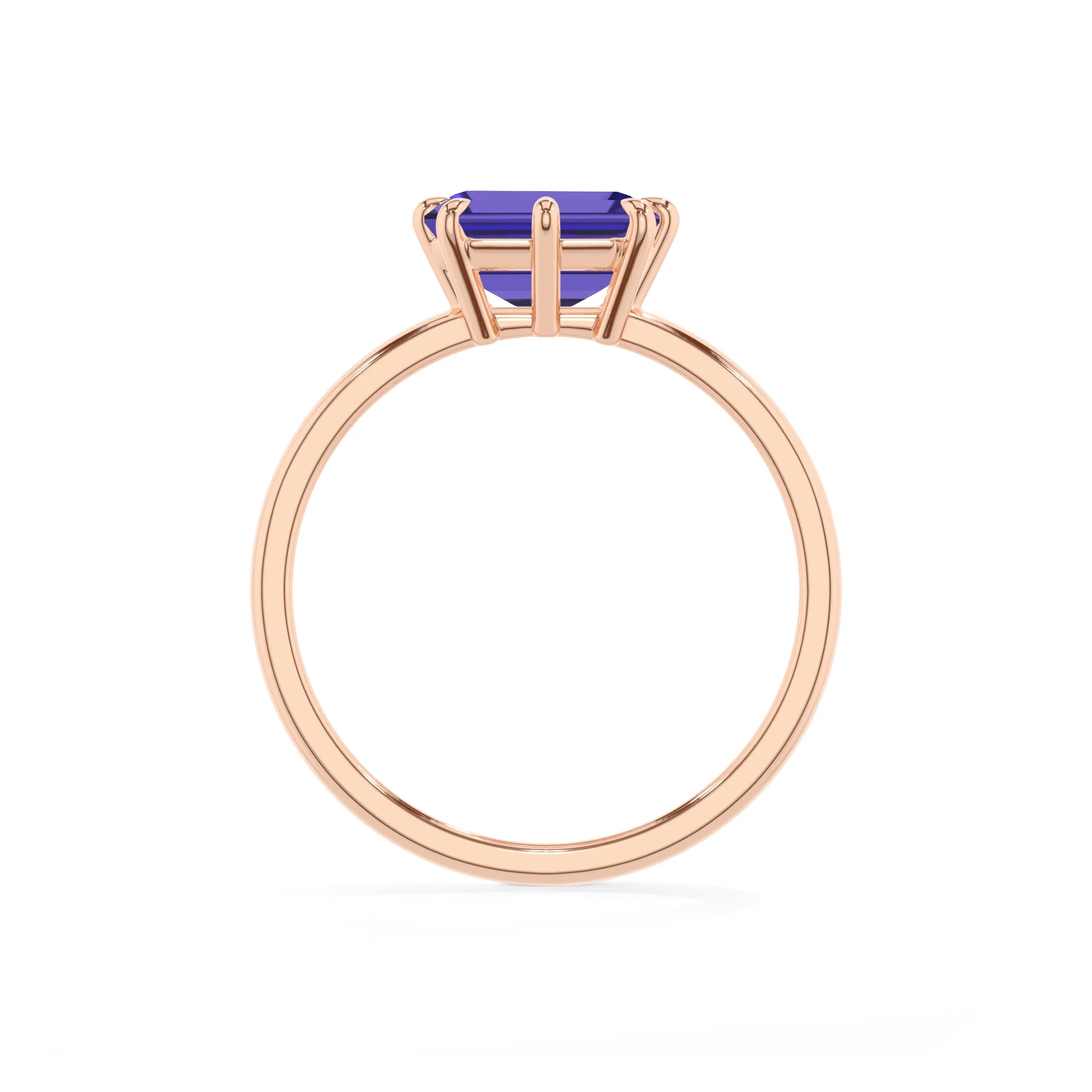 lab grown tanzanite emerald cut solitaire rings in rose gold 