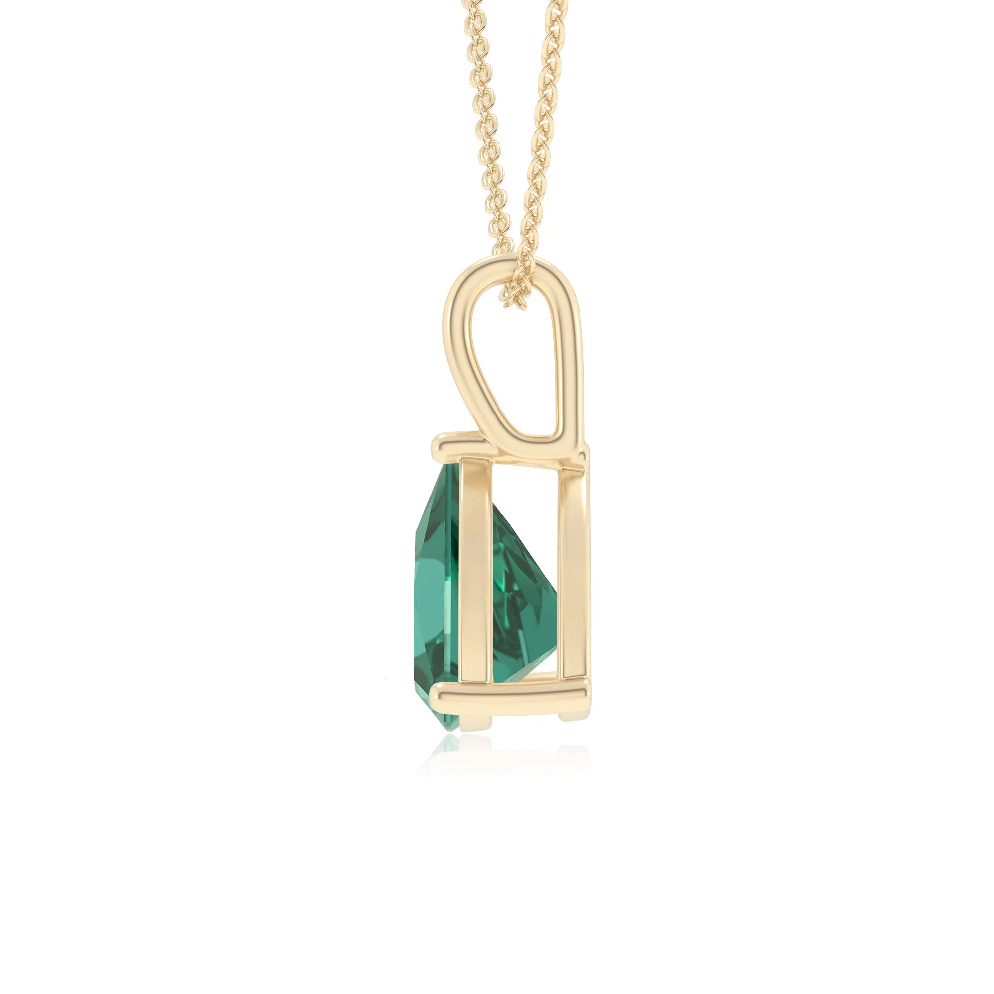 lab grown emerald trillion solitaire necklaces in yellow gold 