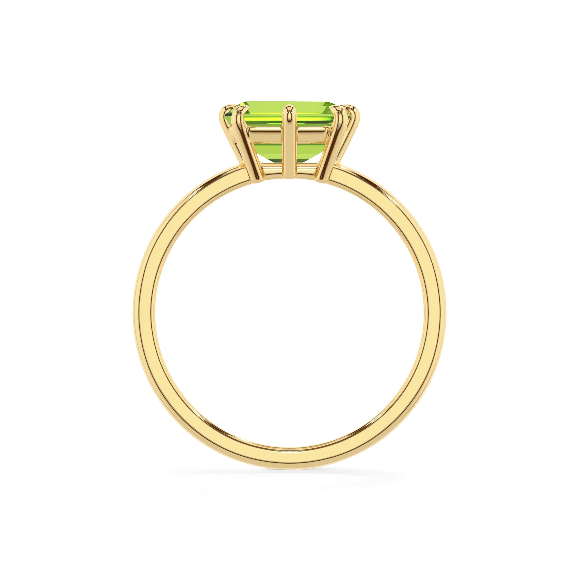 natural peridot emerald cut solitaire rings in yellow gold 