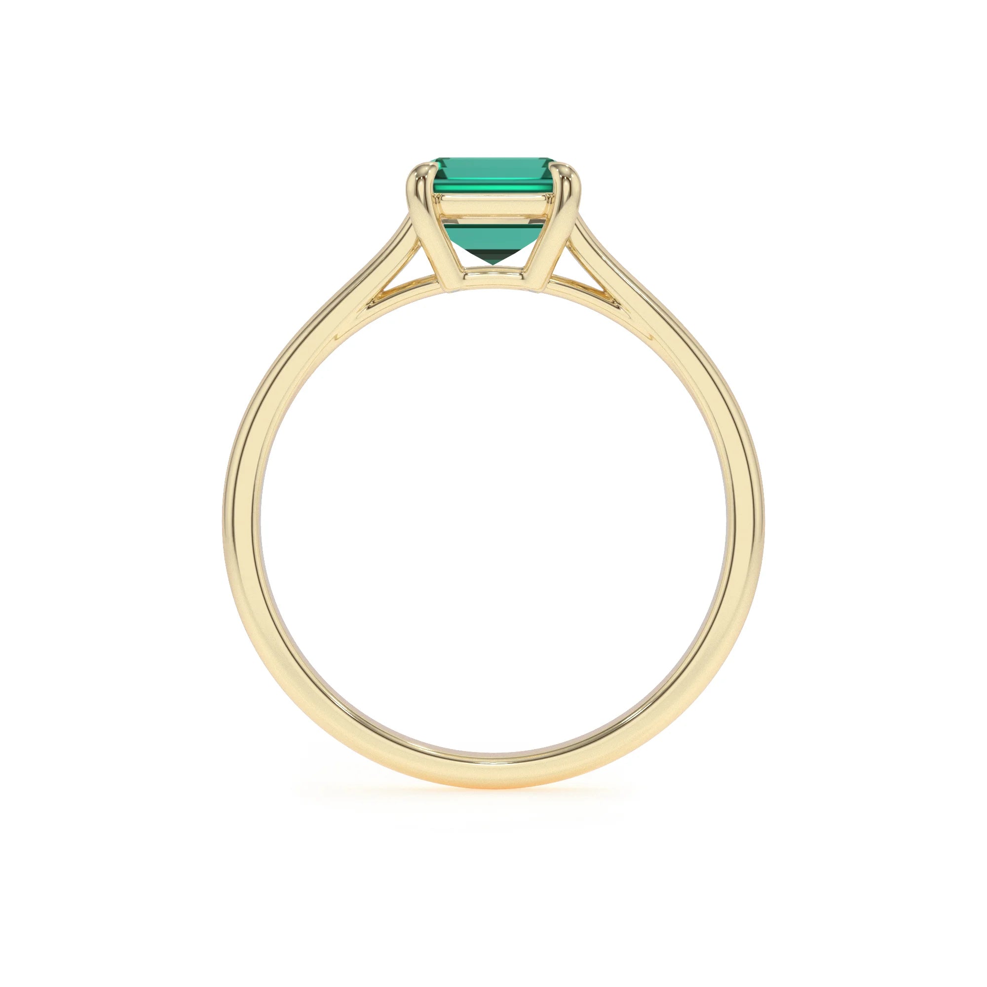 lab grown emerald octogon cut solitaire rings in yellow gold 